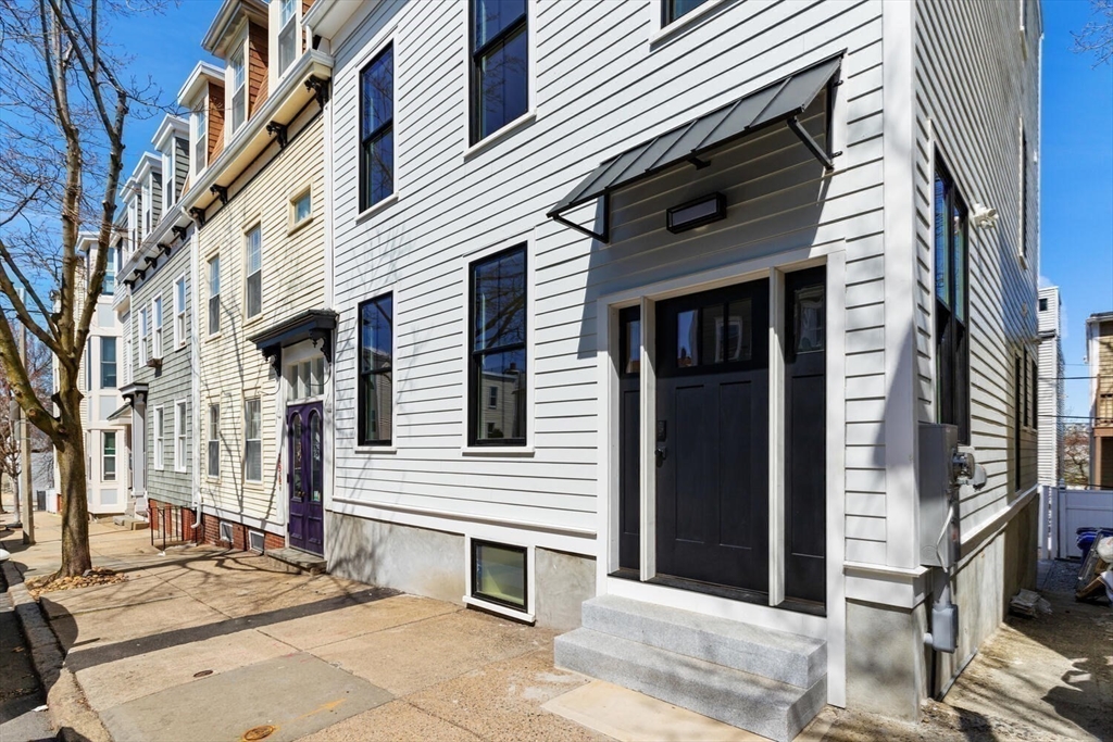 300 West 3rd Street, Unit 300 Boston, MA 02127 - Photo 21 of 23 a view of a house with a house and a outdoor space