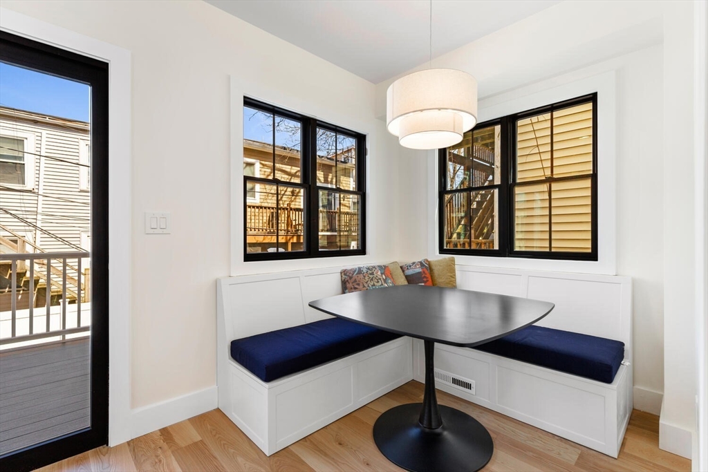 300 West 3rd Street, Unit 300 Boston, MA 02127 - Photo 7 of 23 a living room with furniture and a table