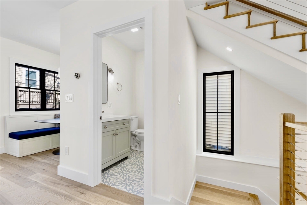 300 West 3rd Street, Unit 300 Boston, MA 02127 - Photo 9 of 23 a view of a hallway with entryway and wooden floor