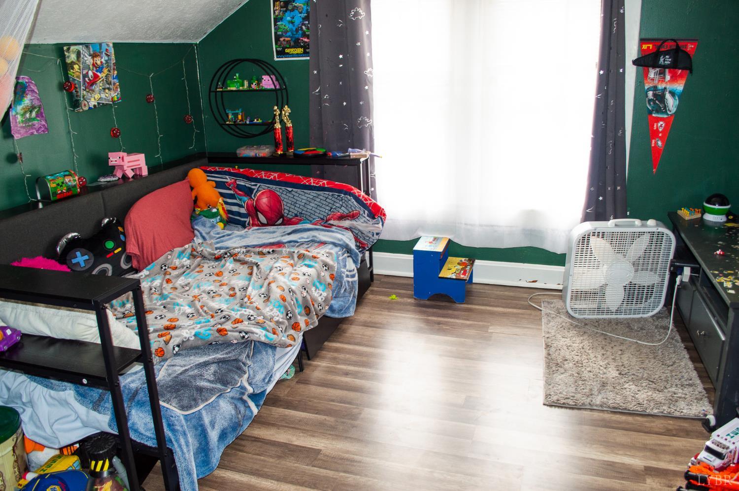 400 Prospect Road Hurt, VA 24563 - Photo 15 of 17 a bedroom with two beds and a couch