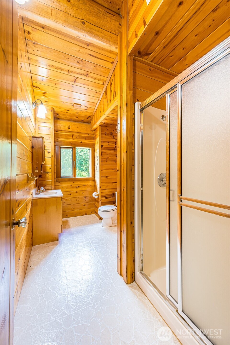 1422 Grauel-Ramapo Road Port Angeles, WA 98363 - Photo 18 of 40 a view of a bathroom with a tub and a shower