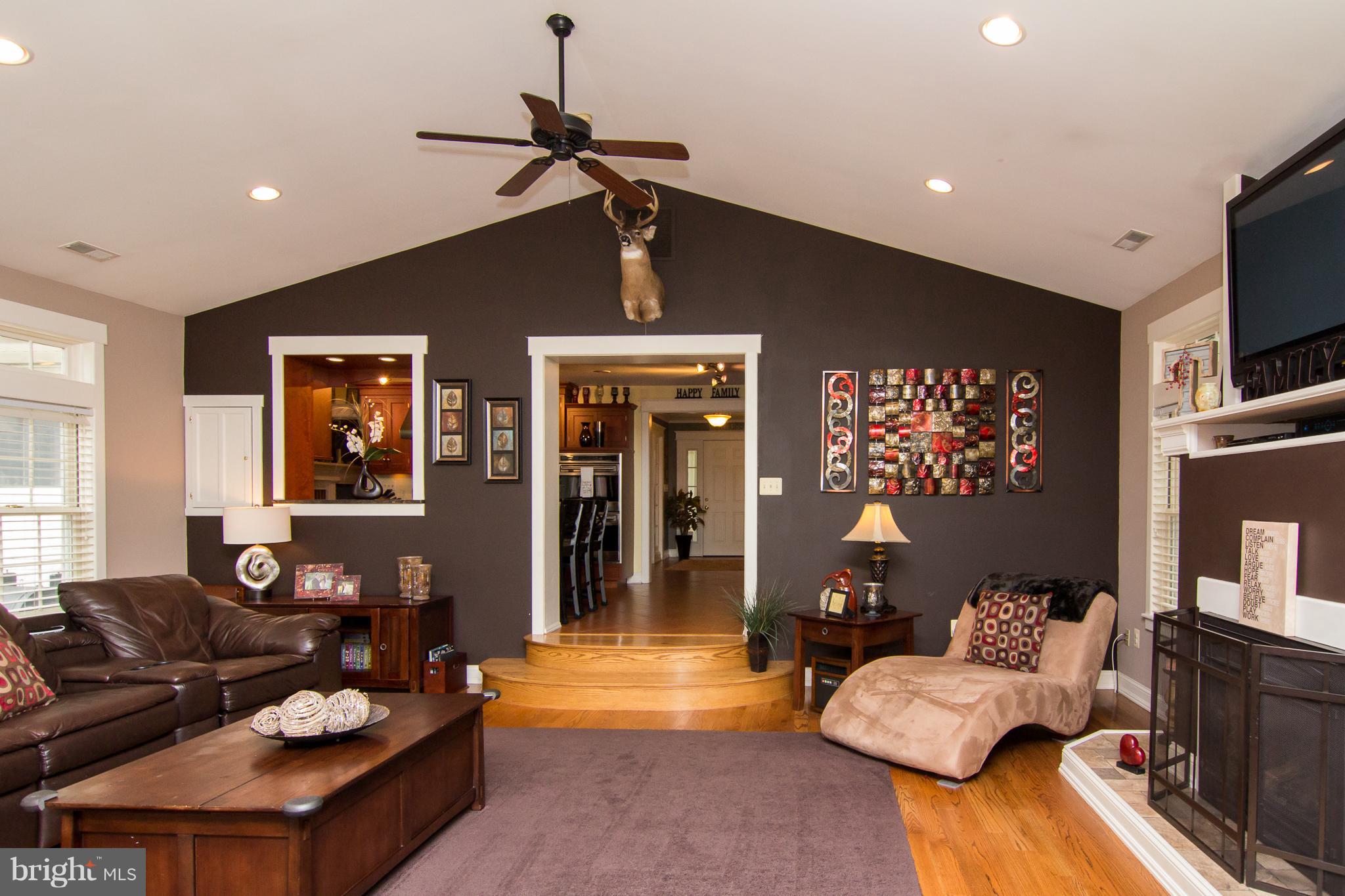 3915 St Paul Road Hampstead, MD 21074 - Photo 11 of 30 23x23 family room cathedral ceilings and fireplace