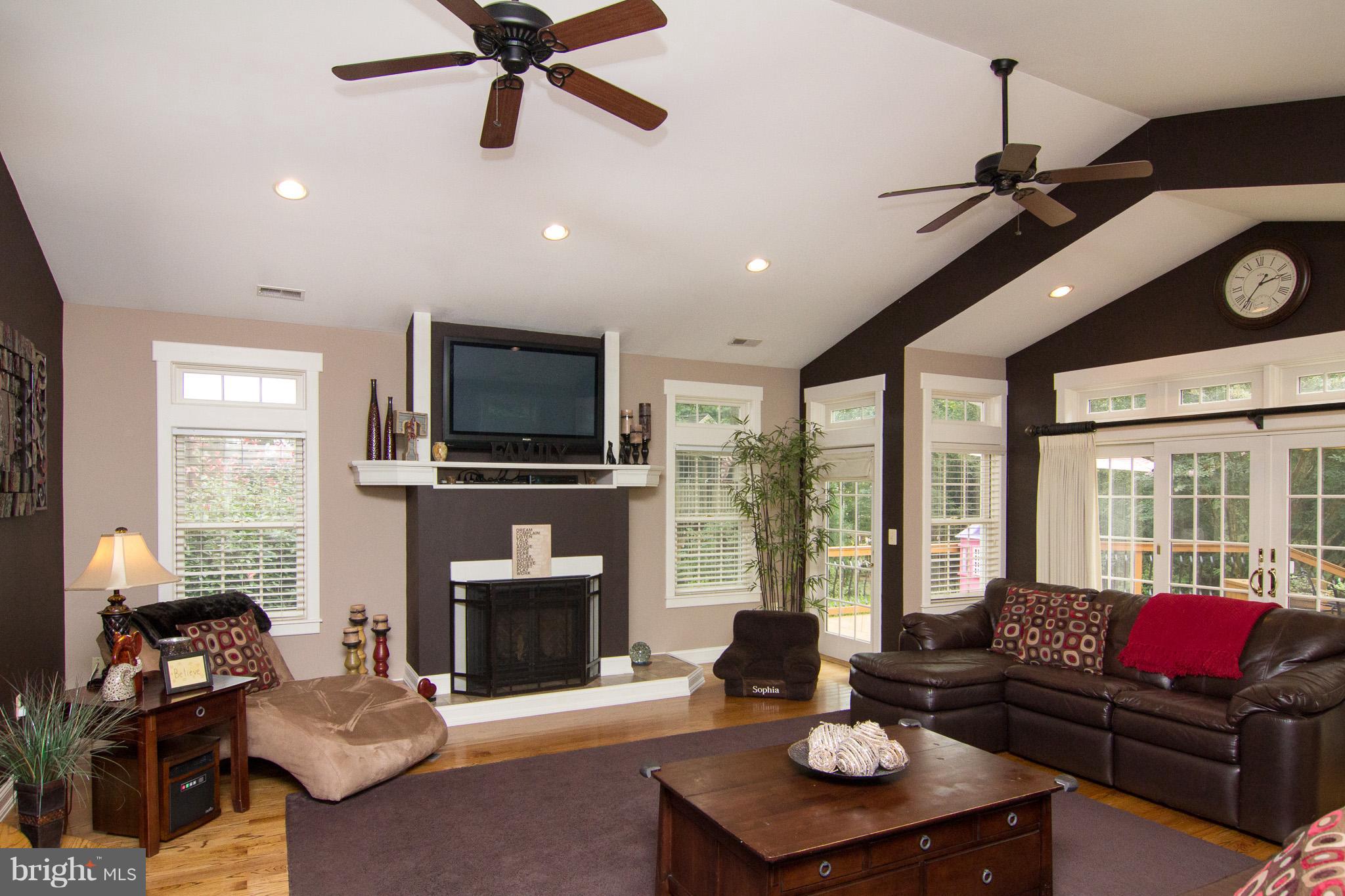 3915 St Paul Road Hampstead, MD 21074 - Photo 12 of 30 Floor to ceiling windows and two ceiling fans