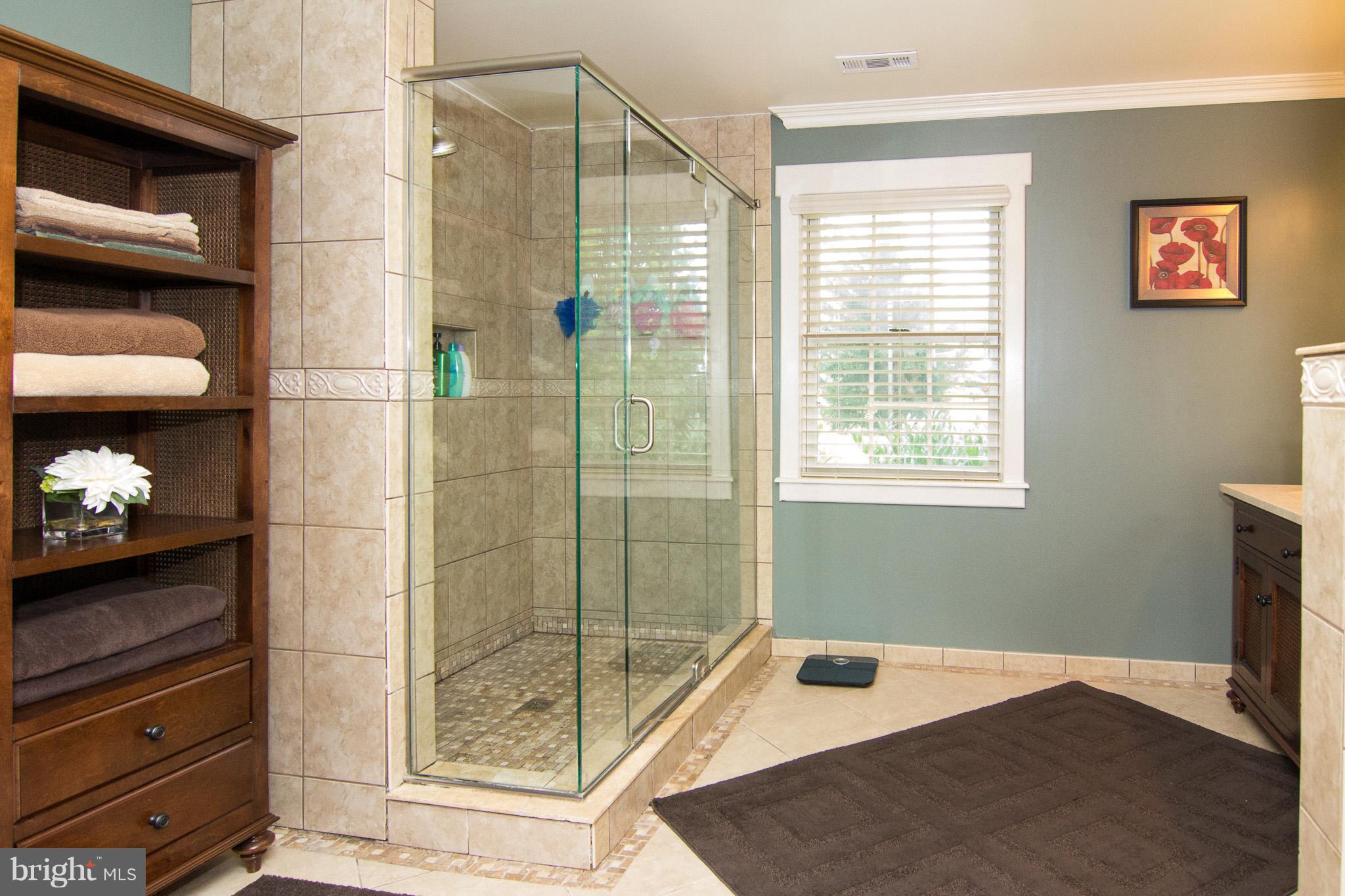 3915 St Paul Road Hampstead, MD 21074 - Photo 21 of 30 Glass enclosed shower with ceramic tile
