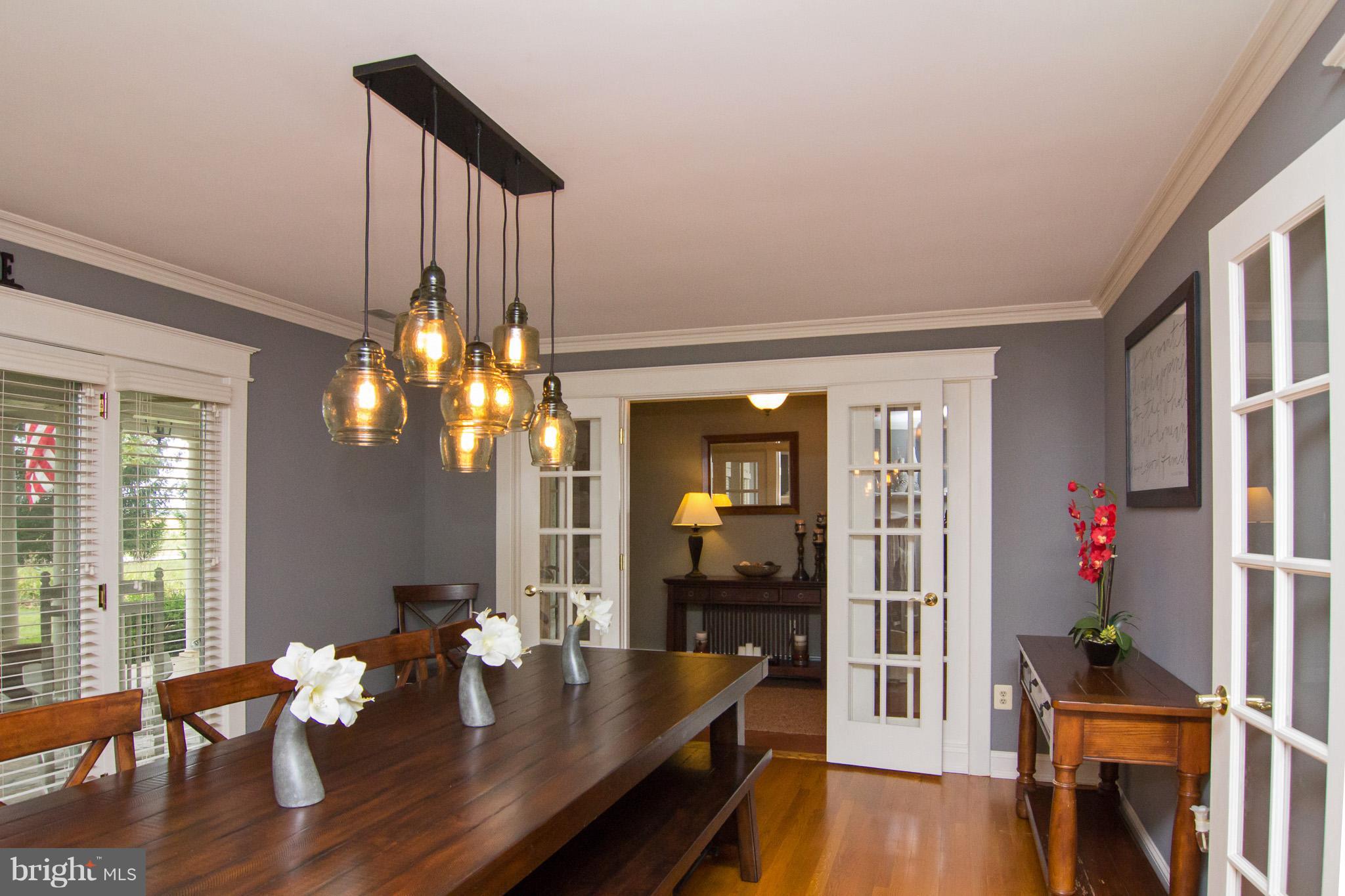 3915 St Paul Road Hampstead, MD 21074 - Photo 6 of 30 French doors, large windows and wood burning fp