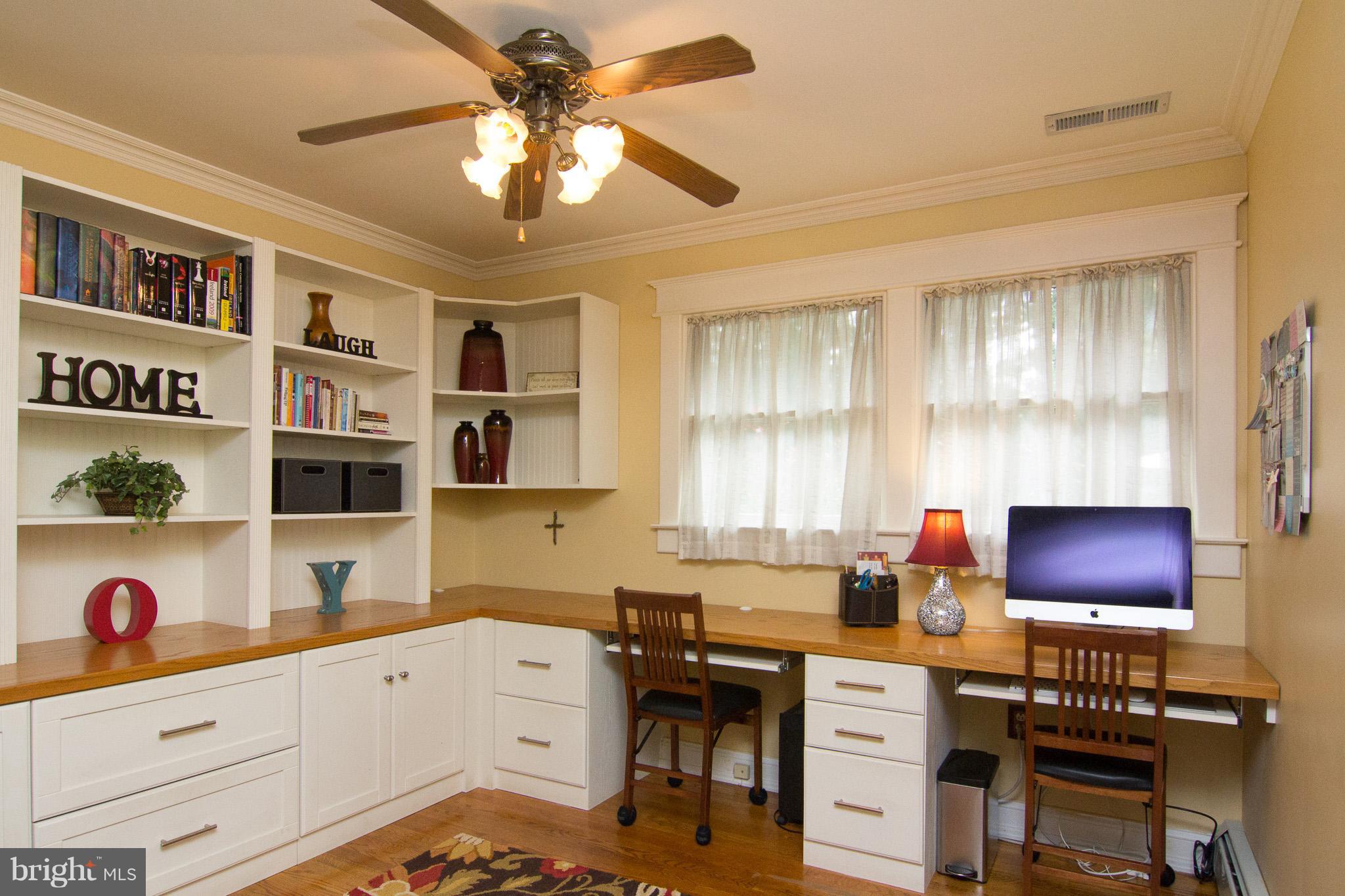 3915 St Paul Road Hampstead, MD 21074 - Photo 9 of 30 Main level open office space with custom built ins