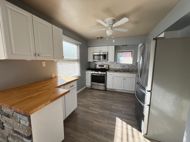 1035 Anderson Road Pittsburgh, PA 15209 - Photo 15 of 41 a kitchen with stainless steel appliances granite countertop a refrigerator and a stove top oven