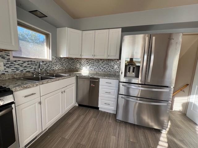 1035 Anderson Road Pittsburgh, PA 15209 - Photo 16 of 41 a kitchen with stainless steel appliances a refrigerator sink and wooden floor