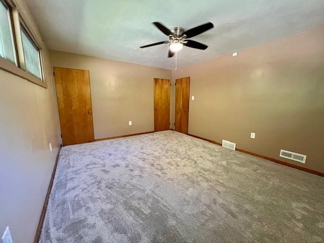 1035 Anderson Road Pittsburgh, PA 15209 - Photo 28 of 41 an empty room with a ceiling fan and window