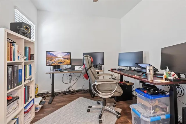 a view of a workspace with furniture