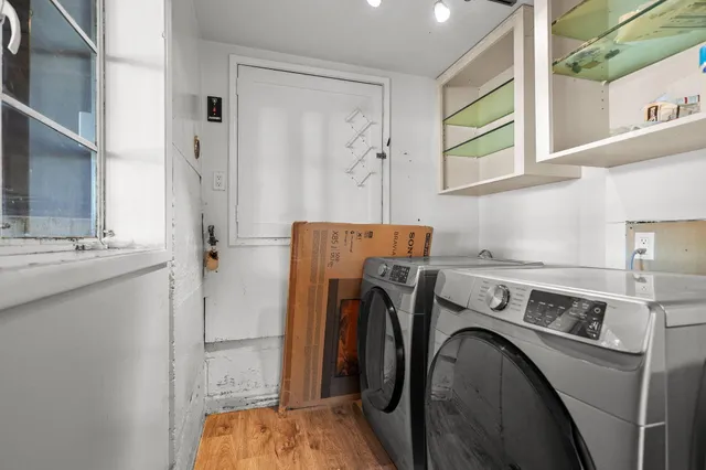 a utility room with dryer and washer