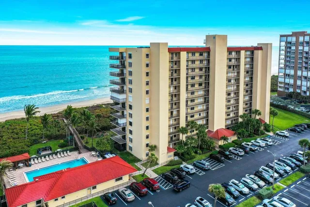 a front view of building with yard