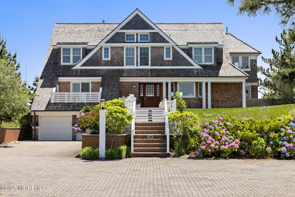 a front view of a house with swimming pool