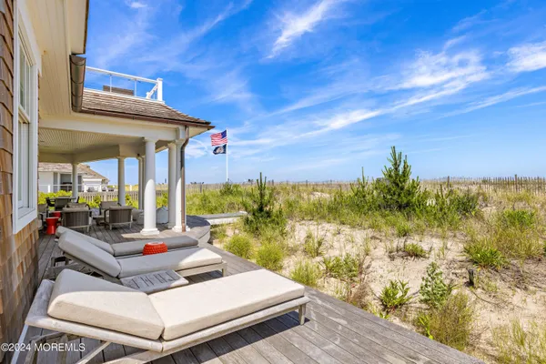 a bedroom with a bed and a walk in closet