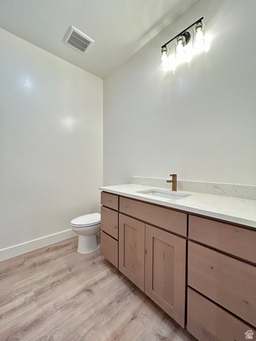 6 South 450th West Gunnison, UT 84634 - Photo 20 of 45 Contemporary vanity with light wood-finish cabinetry, white countertop, and integrated sink
