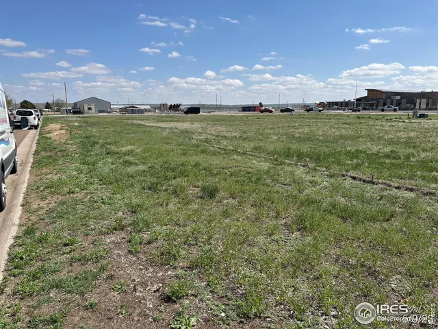 a view of a golf course with a big yard