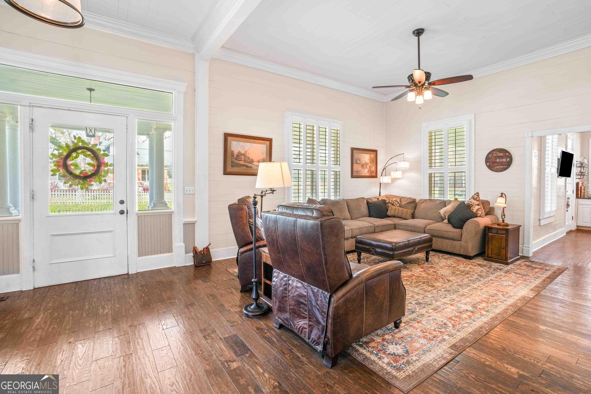 193 Bartee Road Woodbury, GA 30293 - Photo 11 of 84 a living room with furniture and wooden floor