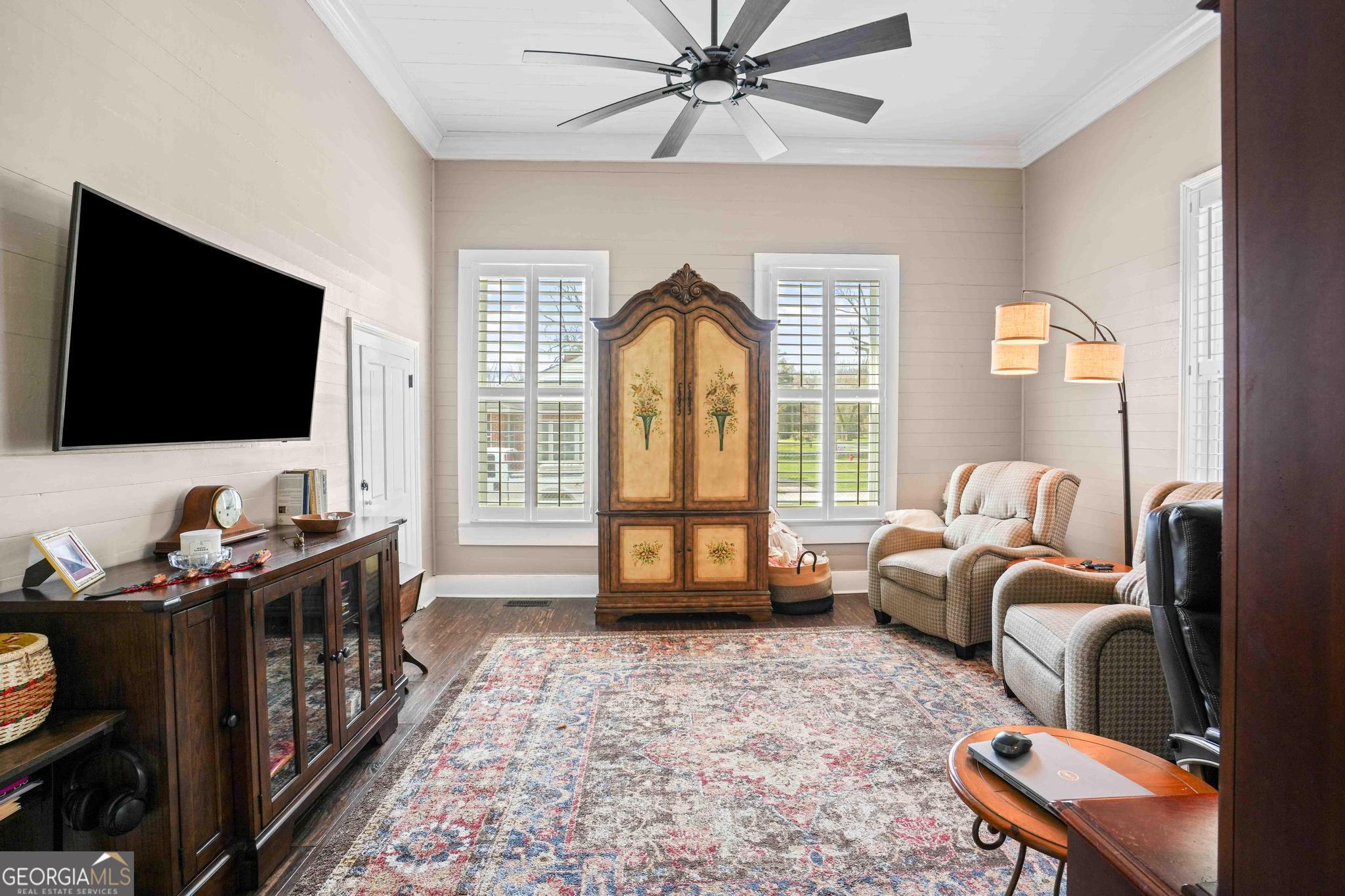 193 Bartee Road Woodbury, GA 30293 - Photo 12 of 84 a living room with furniture and a flat screen tv