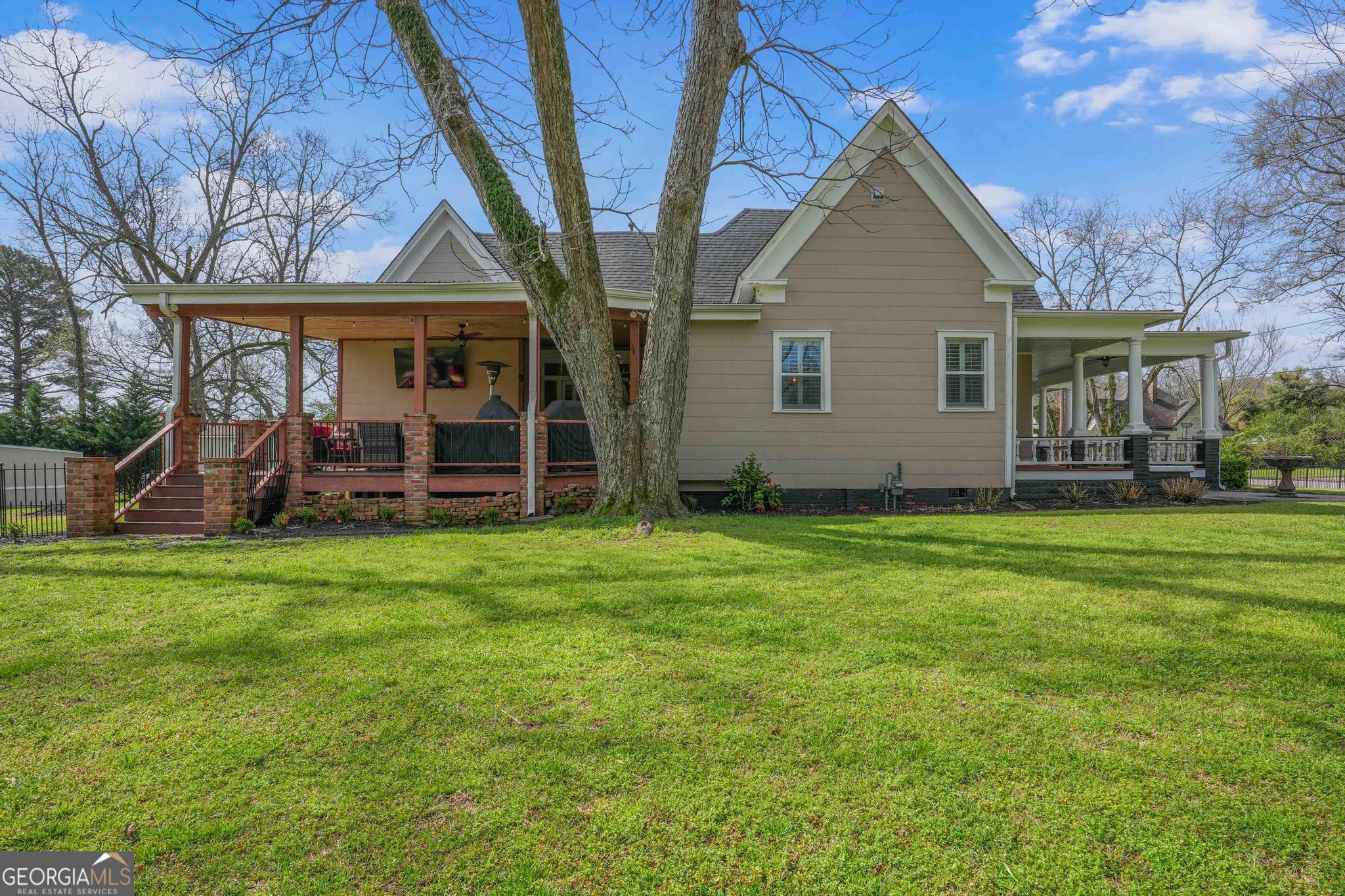 193 Bartee Road Woodbury, GA 30293 - Photo 3 of 84 front view of a house with a yard