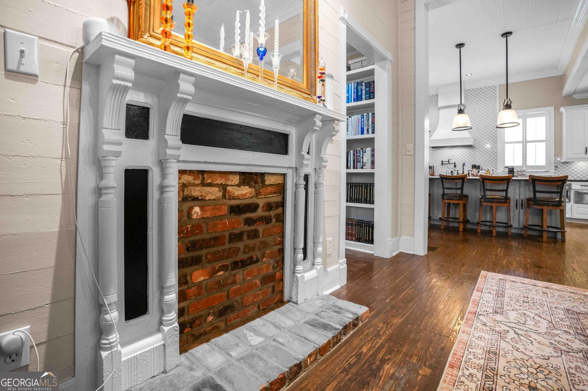 193 Bartee Road Woodbury, GA 30293 - Photo 32 of 84 a living room with furniture and wooden floor