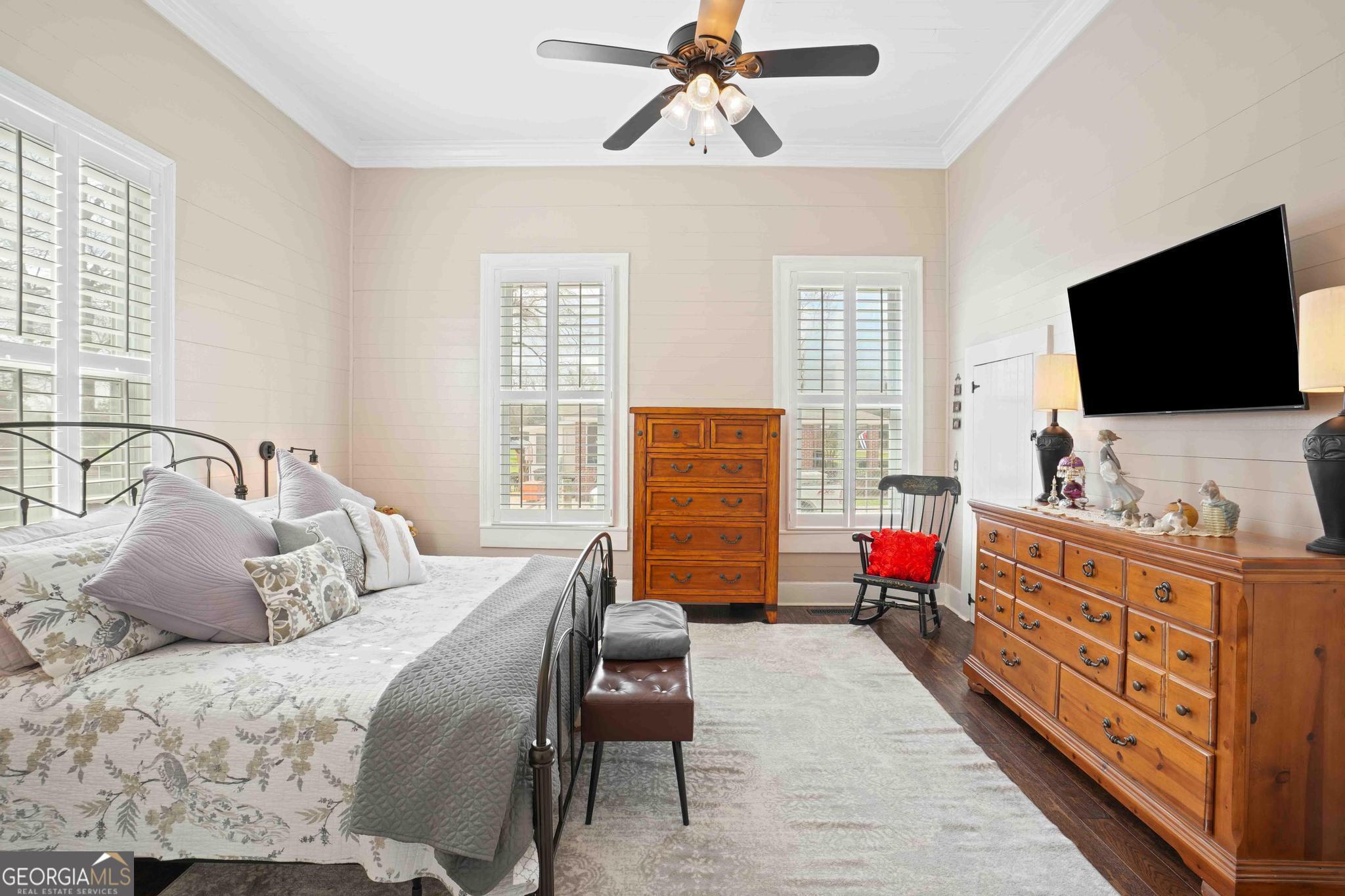 193 Bartee Road Woodbury, GA 30293 - Photo 34 of 84 a bedroom with furniture and a flat screen tv