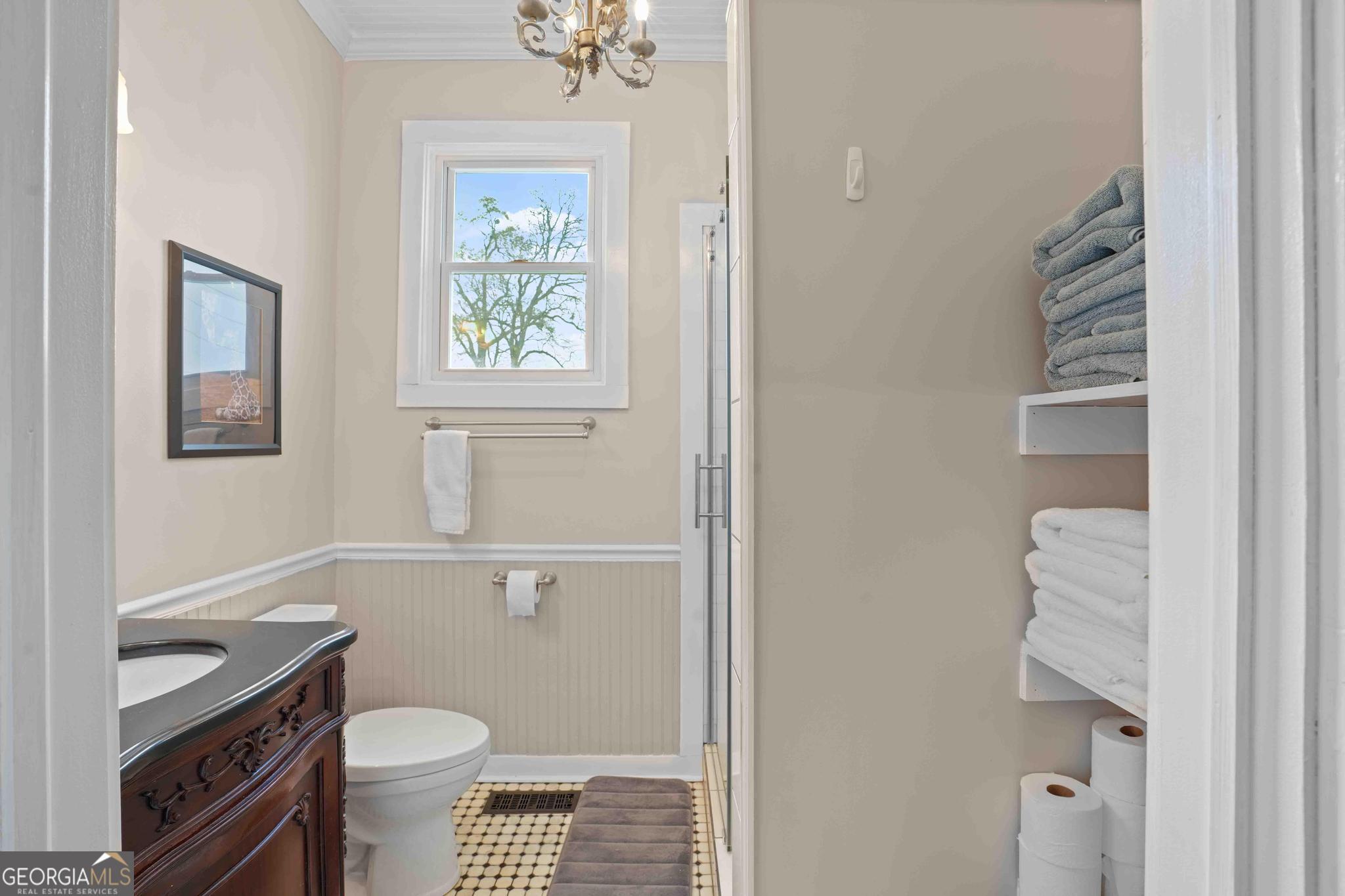 193 Bartee Road Woodbury, GA 30293 - Photo 37 of 84 a bathroom with a granite countertop toilet and a sink