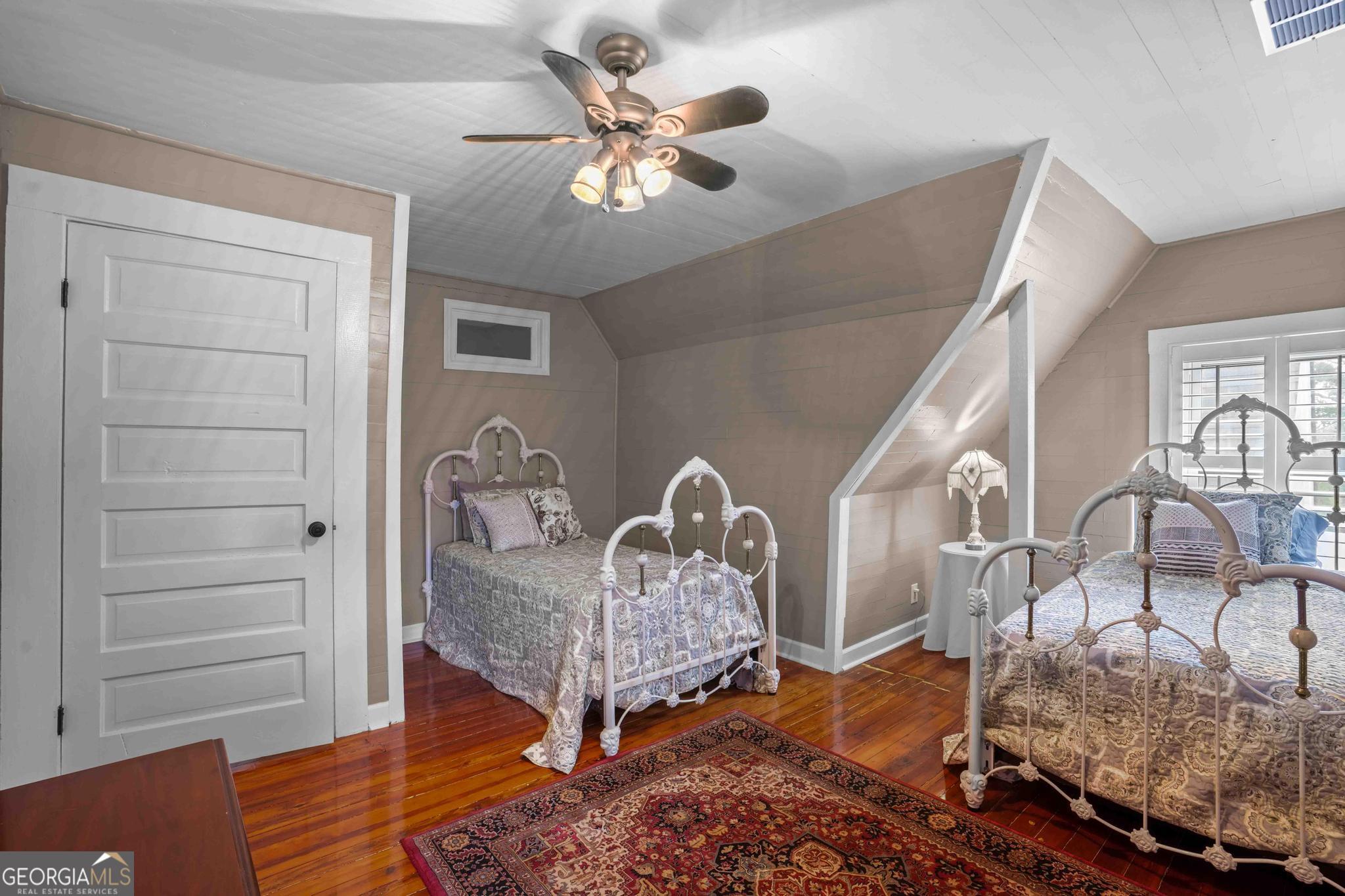 193 Bartee Road Woodbury, GA 30293 - Photo 53 of 84 a living room with furniture and a wooden floor