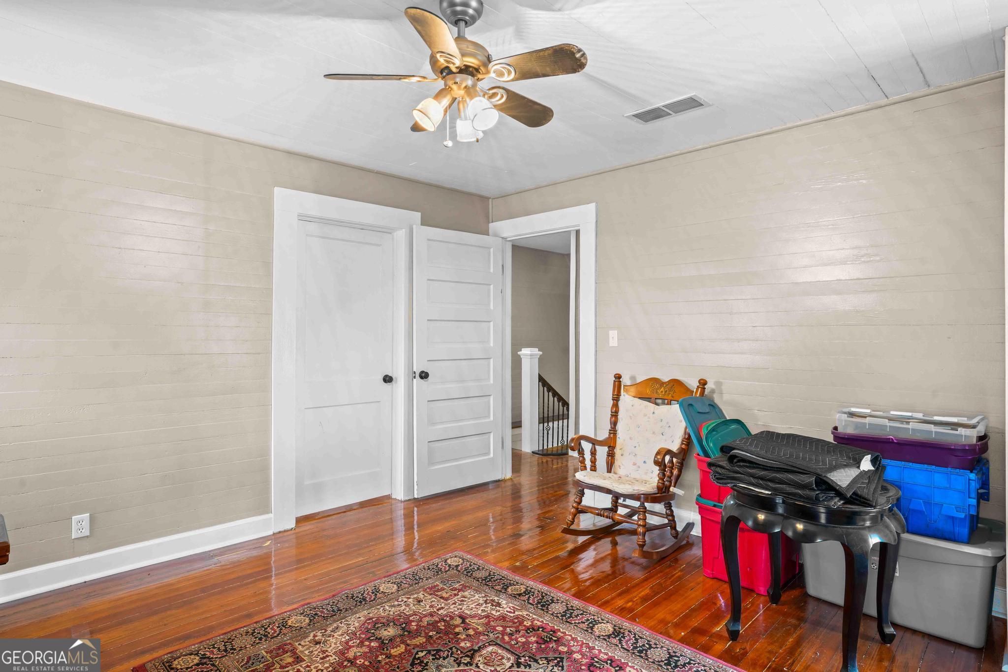 193 Bartee Road Woodbury, GA 30293 - Photo 54 of 84 a view of a workspace with furniture and wooden floor