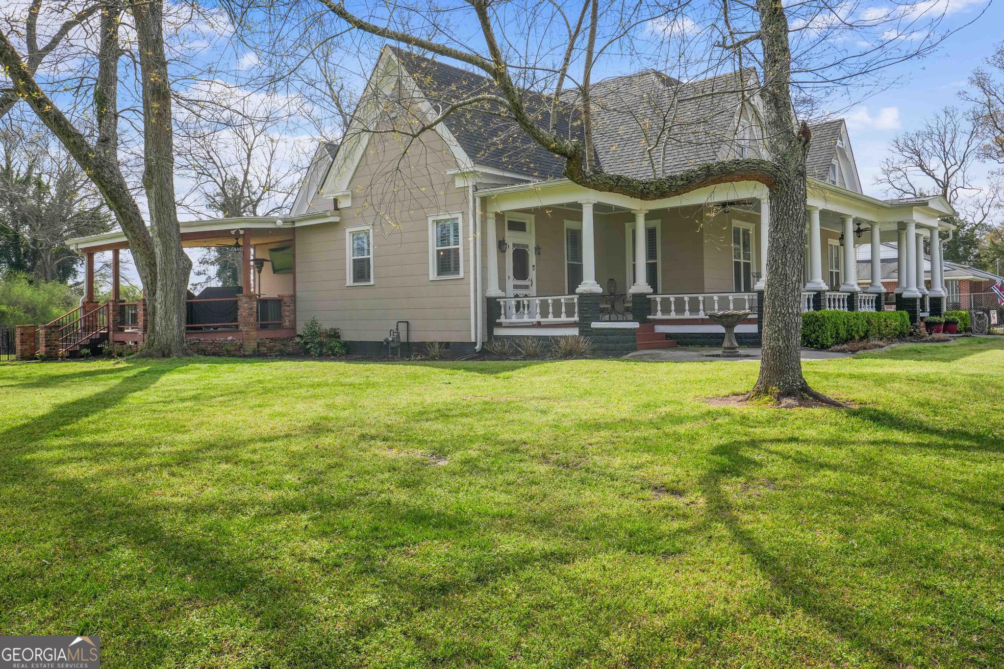 193 Bartee Road Woodbury, GA 30293 - Photo 63 of 84 a view of a house with a yard and sitting area