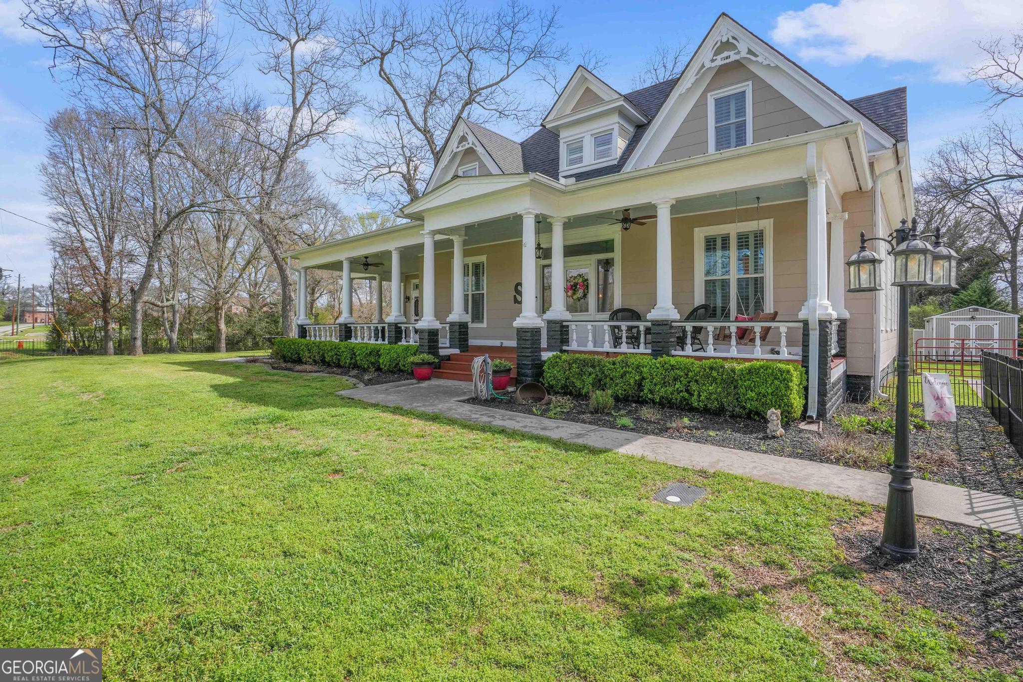 193 Bartee Road Woodbury, GA 30293 - Photo 64 of 84 front view of a house with a yard