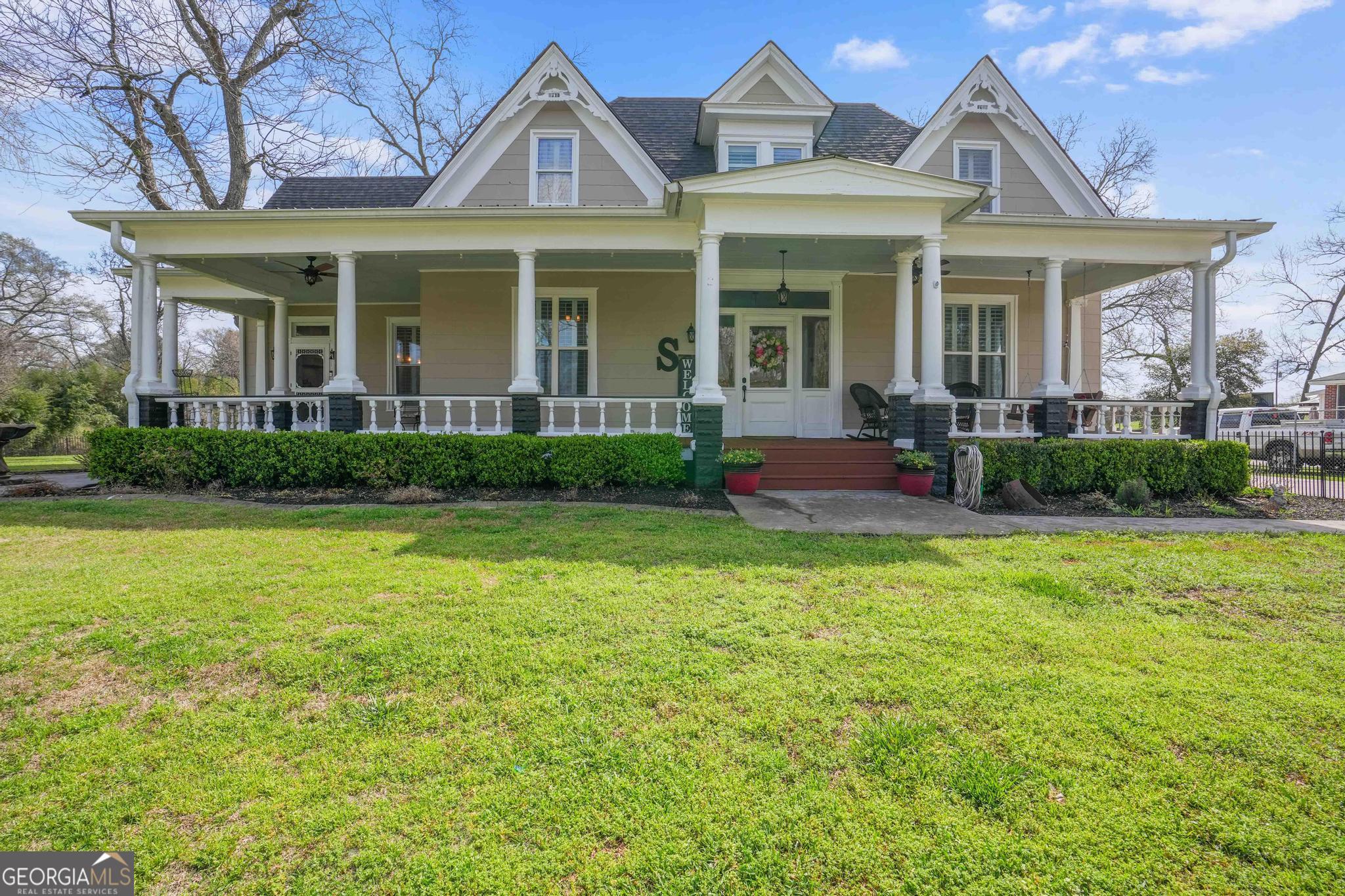 193 Bartee Road Woodbury, GA 30293 - Photo 70 of 84 a front view of a house with garden