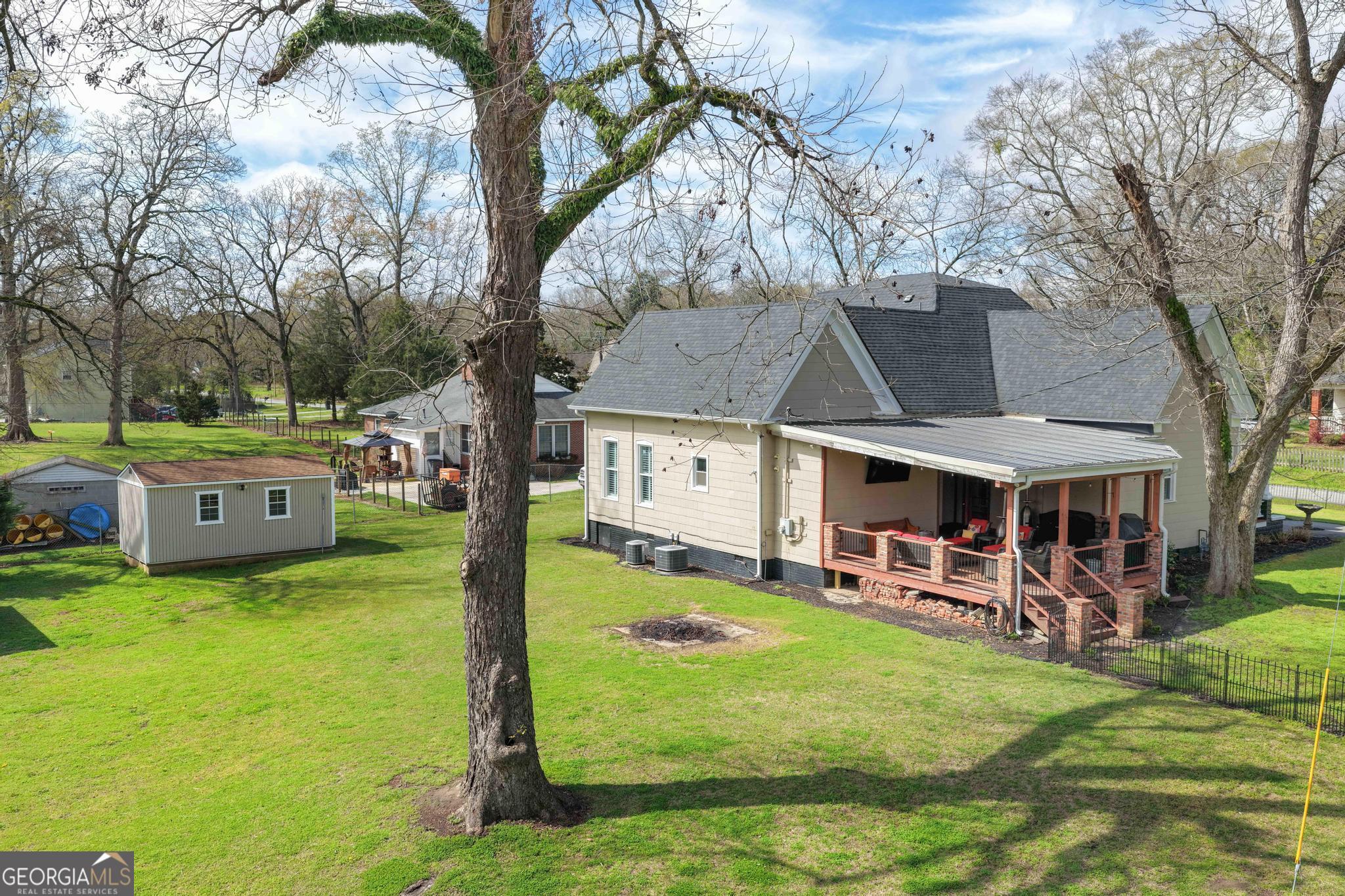 193 Bartee Road Woodbury, GA 30293 - Photo 75 of 84 a view of a house with a yard porch and sitting area