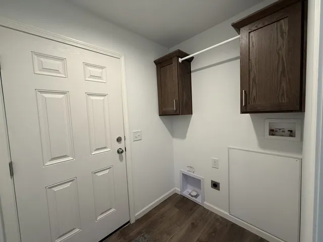 a bathroom with a shower and a sink