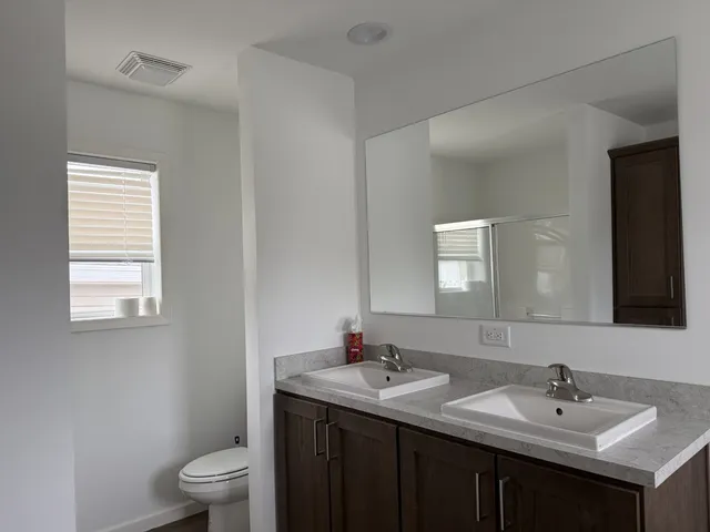 a bathroom with a sink and a toilet