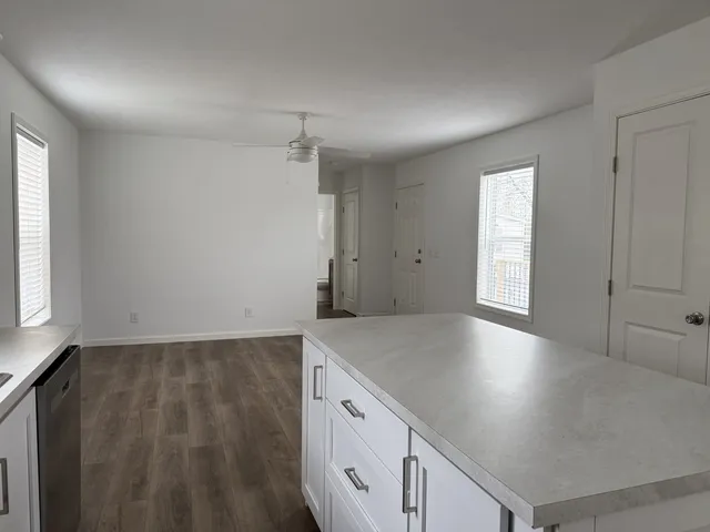 an empty room with windows