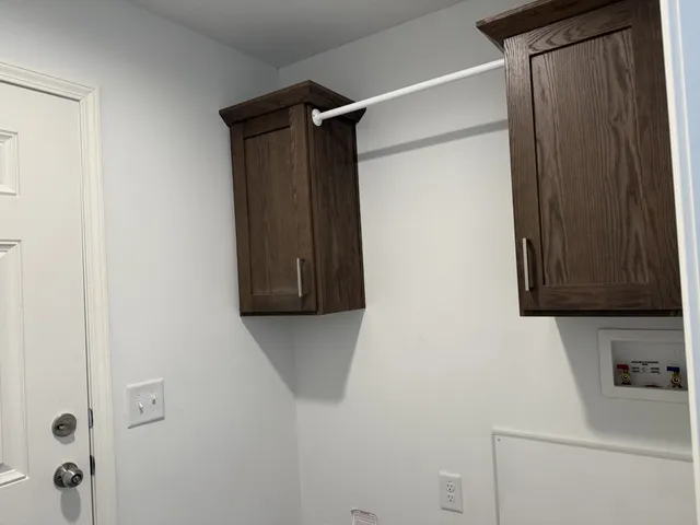 a bathroom with a shower and a sink