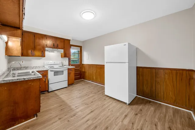 a kitchen with a sink and a cabinets