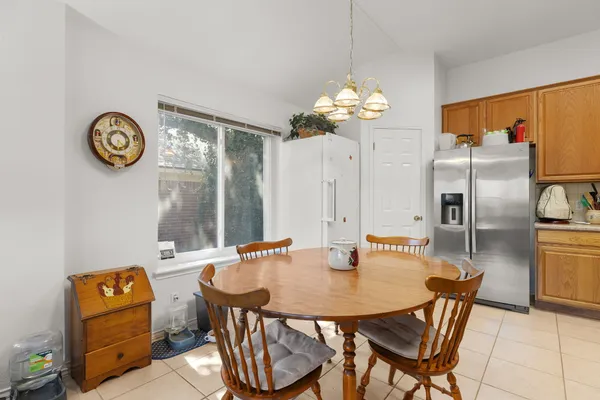 a view of a dining room and a table