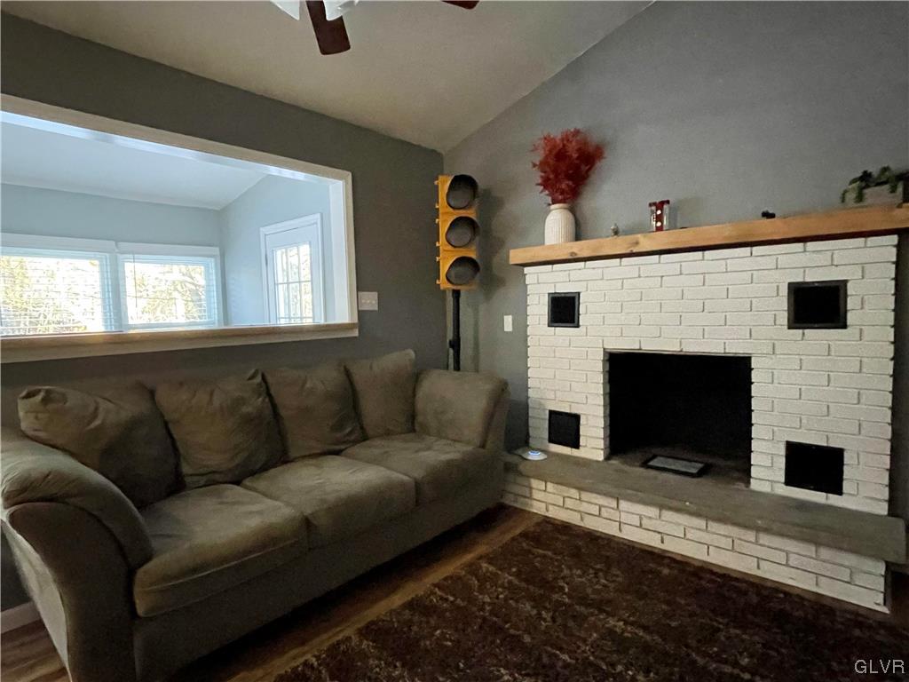 284 Fern Ridge Road Blakeslee, PA 18610 - Photo 11 of 30 a living room with furniture and a fireplace