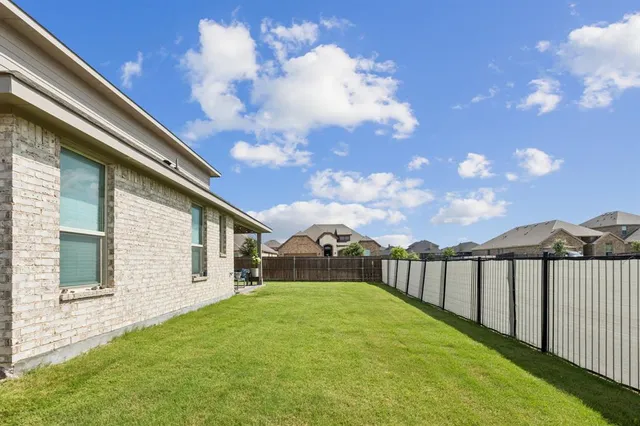 a view of a backyard with a garden
