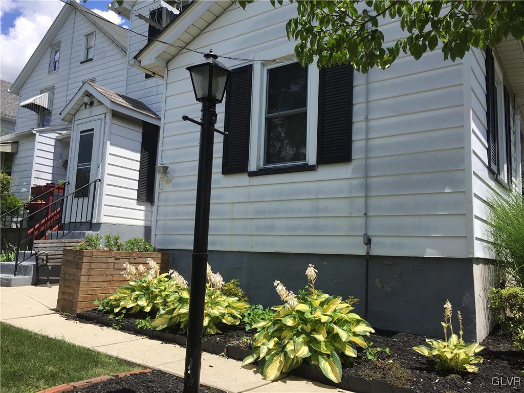 1403 Center Street Bethlehem, PA 18018 - Photo 12 of 25 a front view of a house with a yard