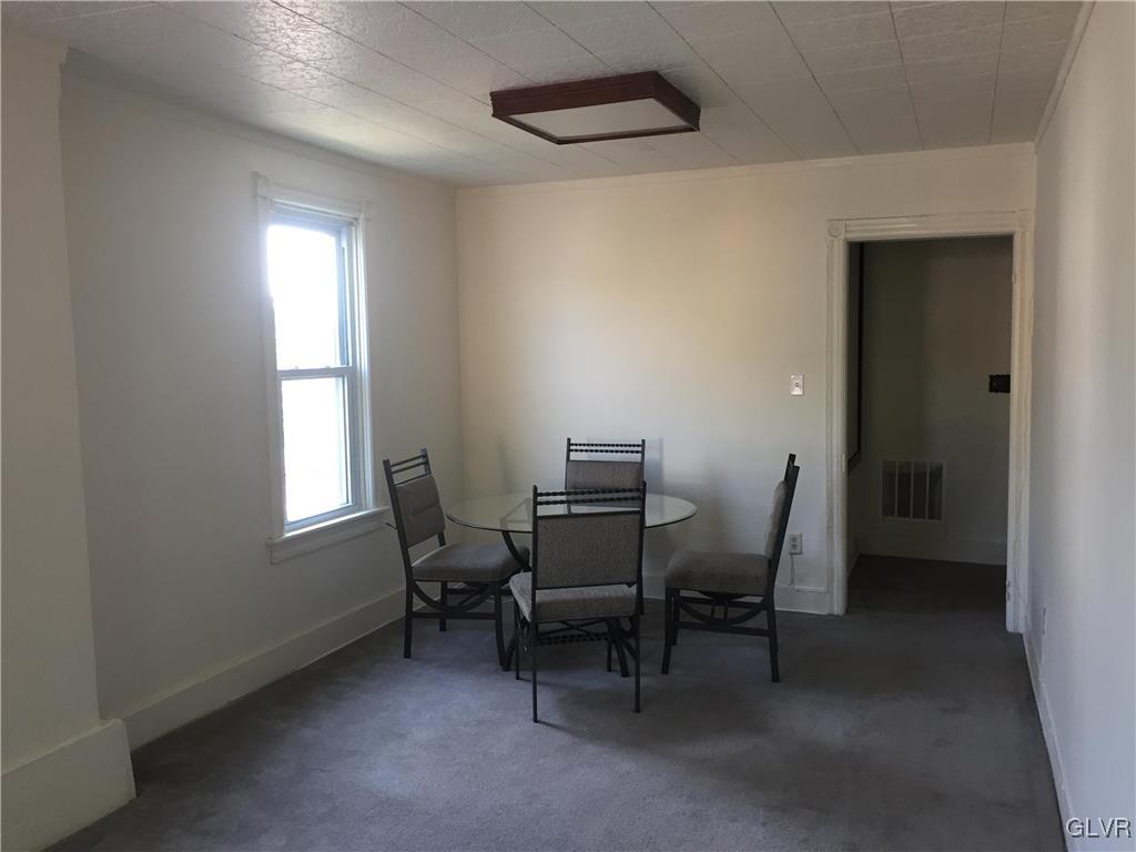 1403 Center Street Bethlehem, PA 18018 - Photo 16 of 25 a view of a workspace with furniture and a window