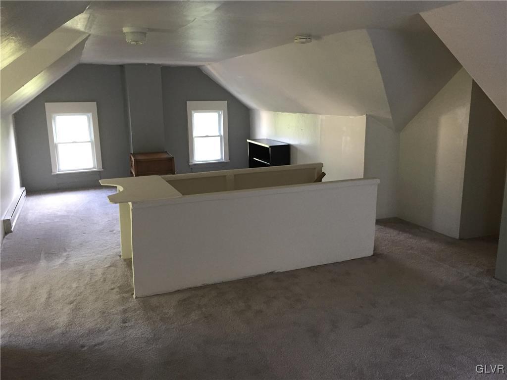 1403 Center Street Bethlehem, PA 18018 - Photo 19 of 25 a living room with furniture and a window
