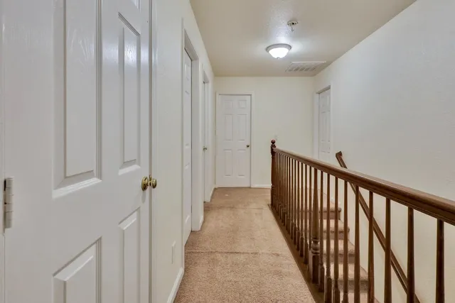 a bathroom with a bathtub and a toilet