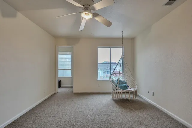an aerial view of a house with outdoor space
