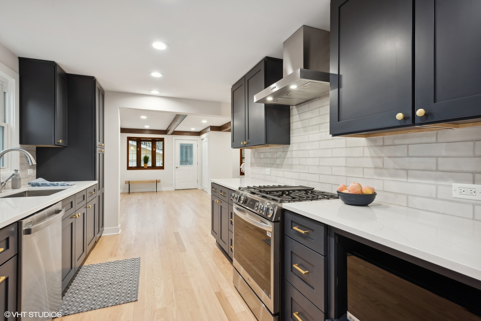 267 West Butterfield Road Elmhurst, IL 60126 - Photo 5 of 29 a kitchen with stainless steel appliances granite countertop a sink stove and refrigerator