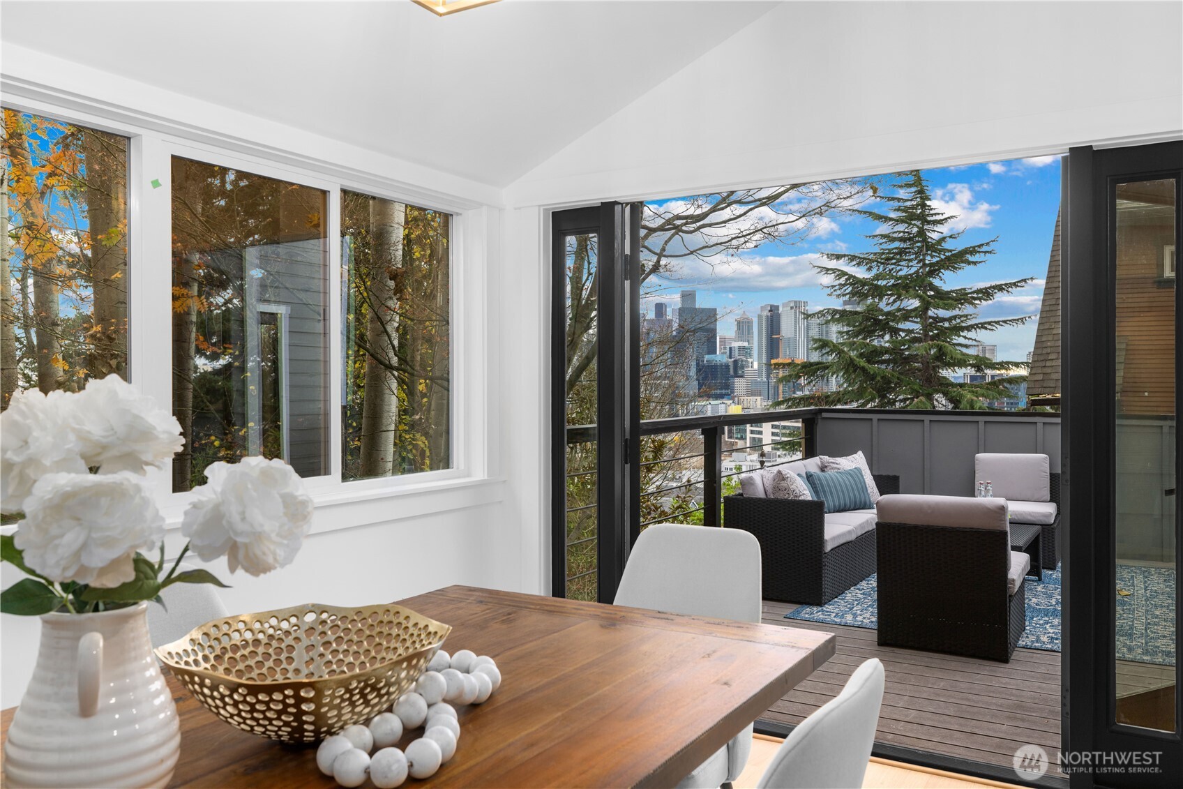 1014 4th Avenue North Seattle, WA 98109 - Photo 11 of 40 a bedroom with furniture and large windows