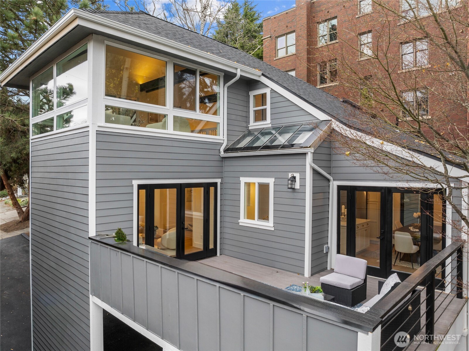 1014 4th Avenue North Seattle, WA 98109 - Photo 2 of 40 a front view of a house with balcony