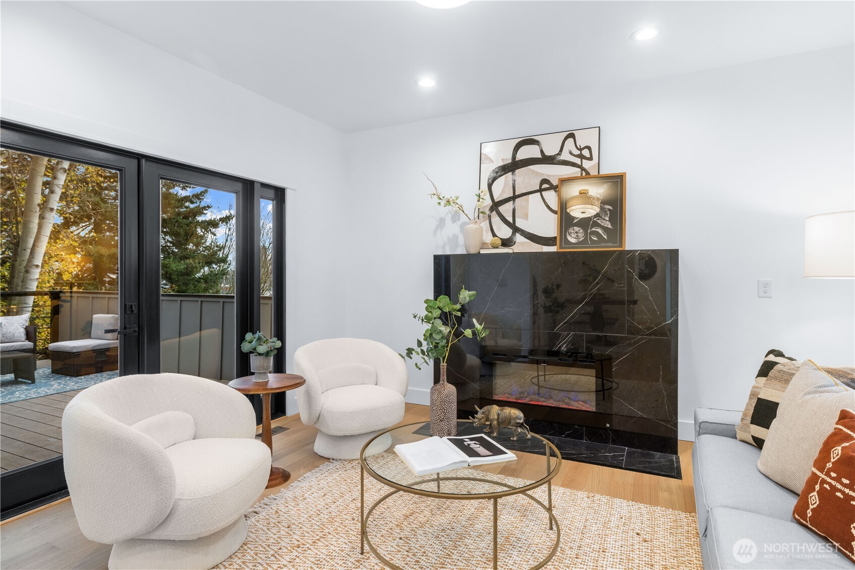 1014 4th Avenue North Seattle, WA 98109 - Photo 7 of 40 a living room with furniture and a floor to ceiling window