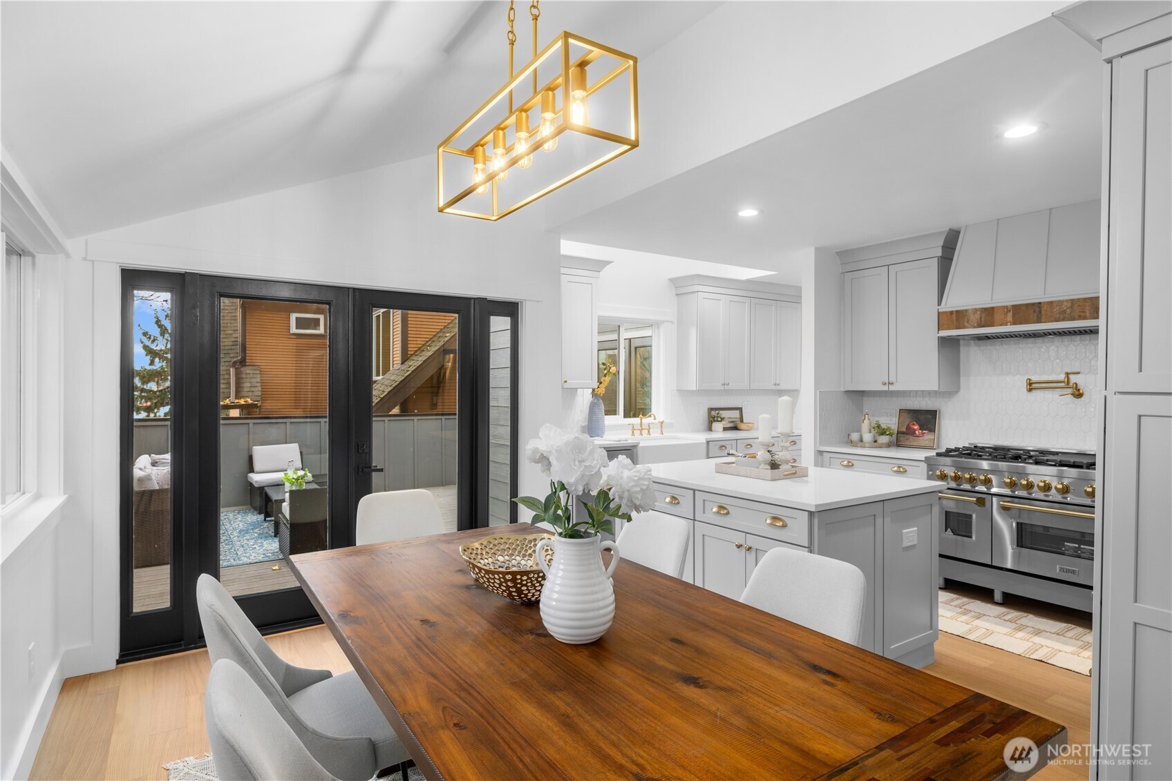 1014 4th Avenue North Seattle, WA 98109 - Photo 10 of 40 a kitchen with a sink and stove